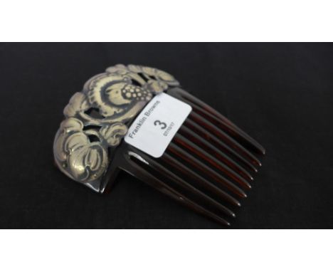 A continental silver mounted hair comb, 9 cm wide 