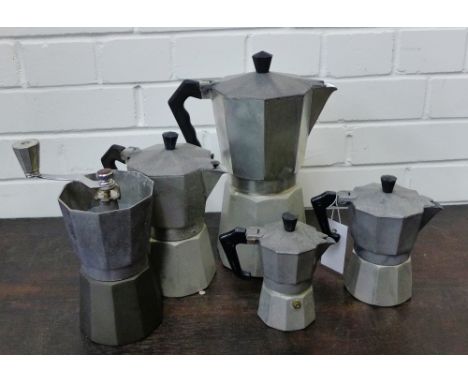 A collection of four French coffee kettles, together with a coffee grinder, (5) 