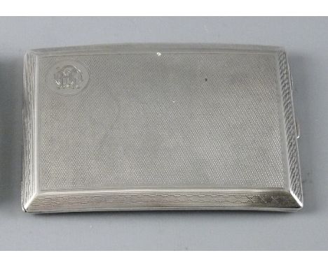 A GENT'S ENGINE TURNED SILVER CIGARETTE CASE with patterned border, slightly curved, 5 troy ozs, Birmingham 1921