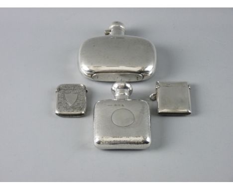 A PLAIN SILVER, SLIGHTLY OBLONG CONCAVE HIP FLASK, 3.5 troy ozs, Sheffield 1914 and a small beaten silver hip flask, 1.7 troy