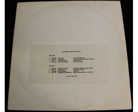 DECEMBER SINGLES SAMPLER - A fantastic Polydor sampler featuring The Jam, The Cure and Headboys amongst others(!) - issued as