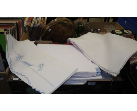A quantity of vintage linen sheets and pillowcases, some with embroidery