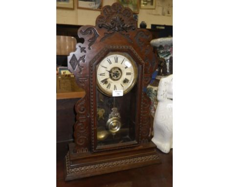 A 19th century American 'gingerbread' mantel clock by 'Ansonia Clock Co Ltd'
