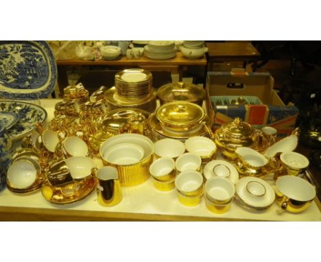 A collection of Royal Worcester gilt dinnerwares, a collection of Continental gilt dinnerwares and a quantity of gilt cutlery