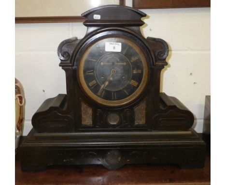 A Victorian slate-cased mantel clock of architectural form