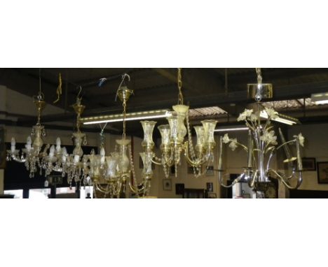 A pair of chandeliers  and similar light fittings