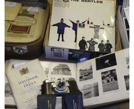 A pre-Second World War photograph album containing photographs of India, a vintage Edixa camera, a small collection of Beatle
