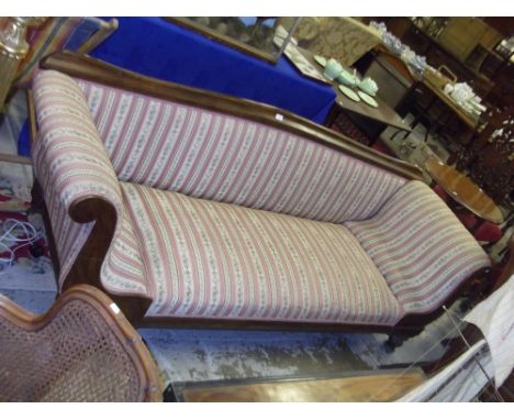 A 19th century walnut  sofa upholstered in Regency striped material