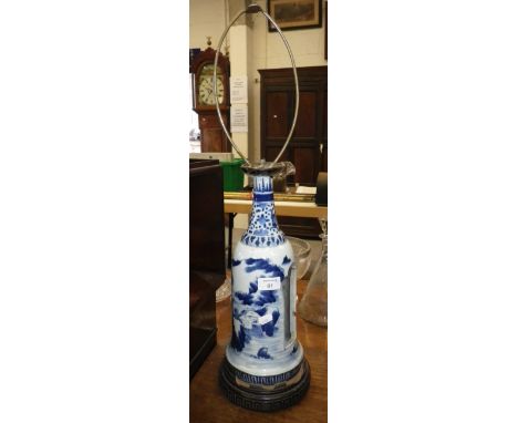 An Oriental blue and white ceramic table lamp with open side