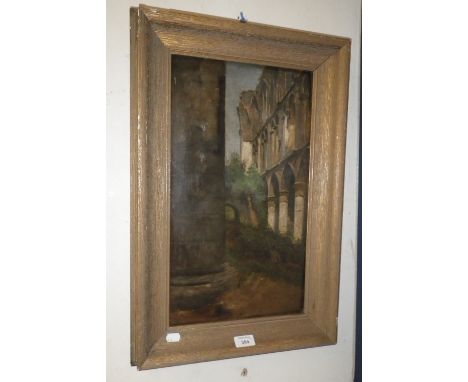 An oil on panel painting of the interior of a ruined abbey, signed G Guy and dated 1862