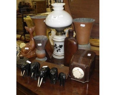 A pair of brass vases, an oil lamp and similar items