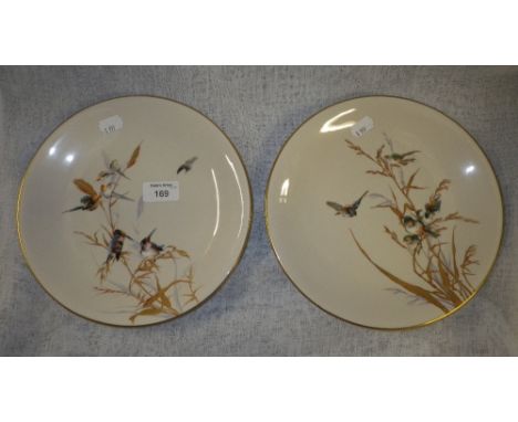 A pair of Worcester plates decorated with birds amongst rushes, possibly decorated by Edward Salter
