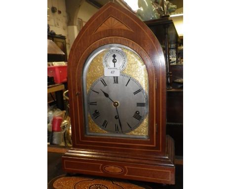 An Edwardian mahogany cased bracket clock with silvered dial