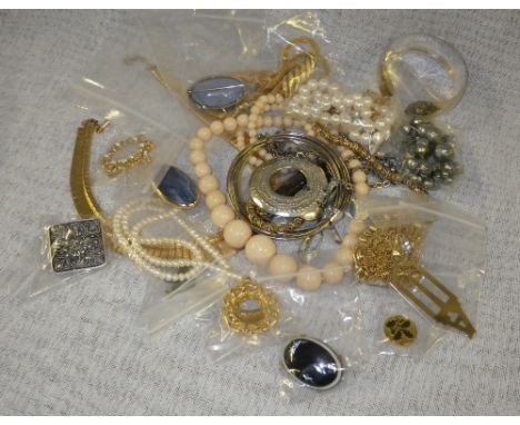 A large quantity of mixed costume jewellery including an Middle Eastern silver bangle 