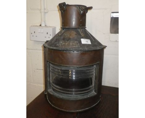 A copper ship's lamp 'Port' with maker's label 'Telford, Grier & Mackay, Glasgow'
