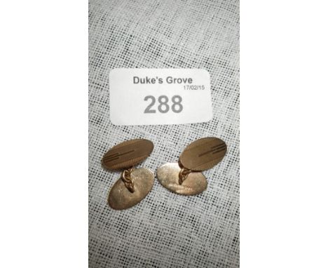 A pair of 9ct yellow gold cufflinks with Art Deco engine-turned decoration