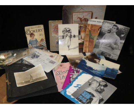 A collection of vintage programmes, photographs, stamps and other assorted ephemera