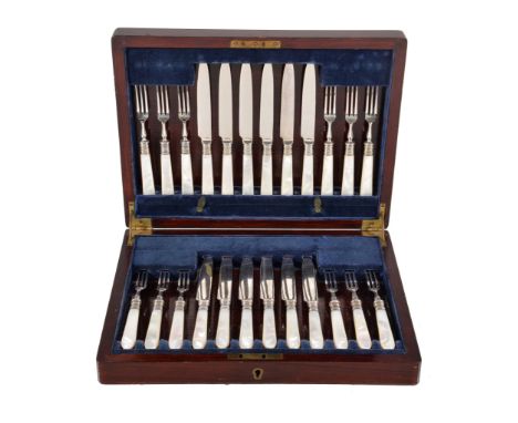 Ω A cased set of twelve Edwardian fruit knives and forks with silver ferrules by Harrison Brothers &amp; Howson, Sheffield 19