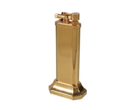  Dunhill, a gold plated Unique gas table lighter,   recent, with vertical linear decoration, engraved   F.B  ., 10cm (4in) hi