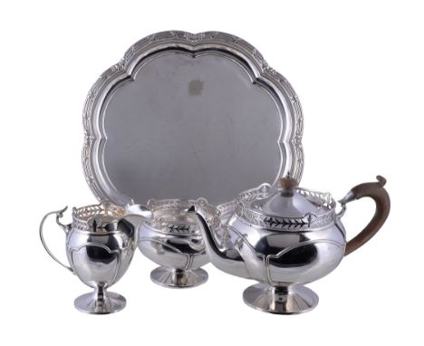  A silver three piece tea service by Reid  &  Sons Ltd.,   London 1913 and 1915, the tea pot with a composition domed finial 