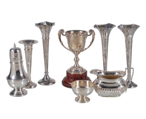  A collection of silver items,   to include: a twin handled trophy cup by Barker Brothers, Chester 1923, with twin foliate ca