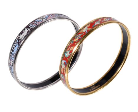  Hermes, two gilt metal and enamel bangles,   ducks on a red ground and stylised artwork, each 6.5cm diameter, 1cm wide 