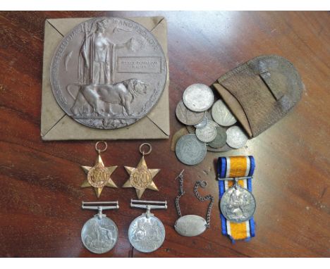 A small leather pouch containing a selection of coins, a 1914 War medal to F. C. Iveson A. M. 1 R. N. A. S., four Second Worl