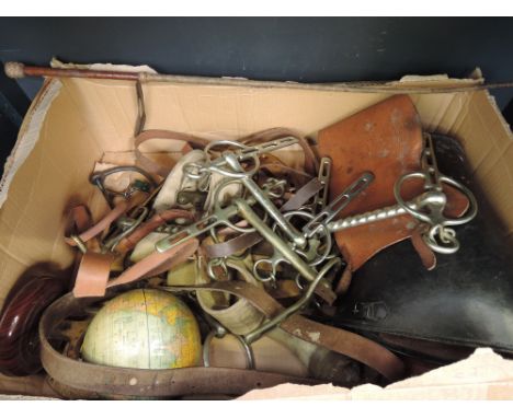 A box of miscellaneous, including vintage leather gaiters, Liverpool snaffle miniature globe, etc