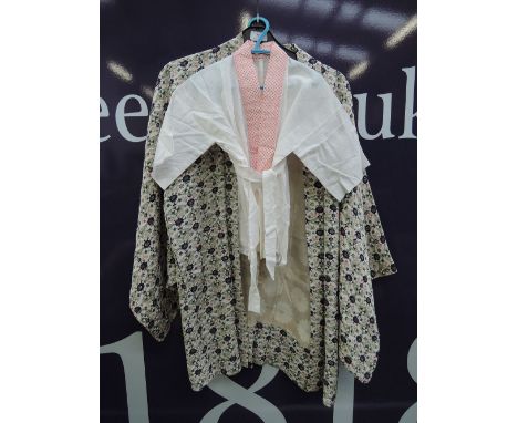 A Japanese ladies lightweight fine cotton informal Haori having cream lining and floral print decoration and a small childs m