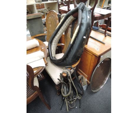 A vintage leather horse collar, a pair of black painted horse Hames, a leather and brass horse bridle, horse bits including L