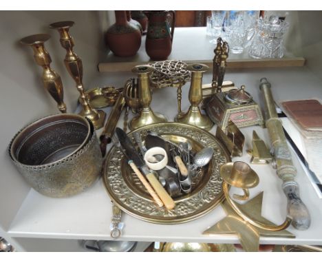 A selection of brassware including candlestick, inkstand etc