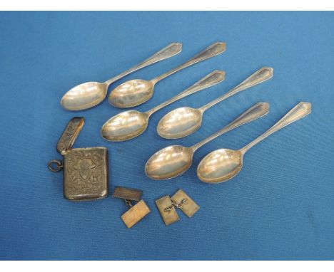 A set of six teaspoons of plain form, Sheffield 1944, C W Fletcher & Son Ltd, a silver vesta having foliate decoration and in