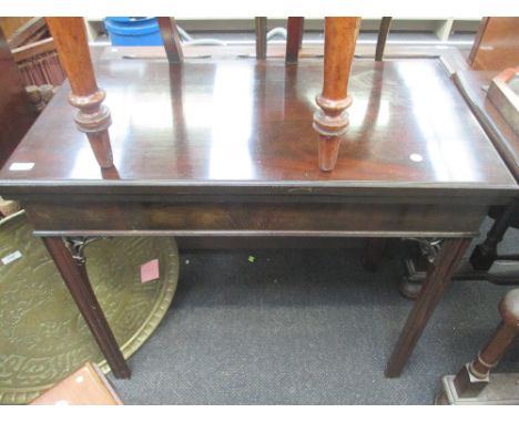 A 19th century mahogany card table having baize top on Chippendale style gate legs