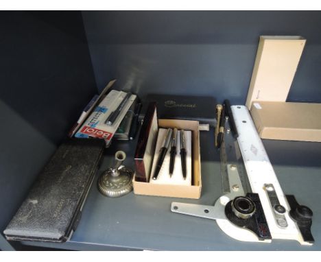 A selection of vintage pens and stationary equipment, including Mont Blanc, Berol, etc.