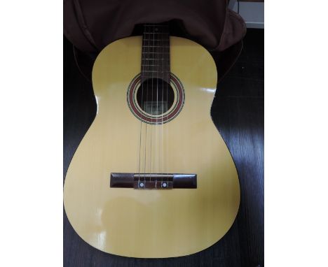 A vintage spanish style acoustic guitar