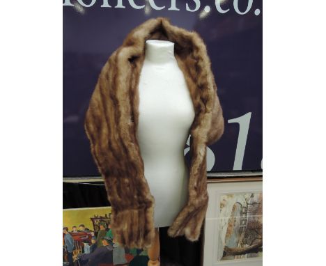 A vintage mink fur stole having raised collar