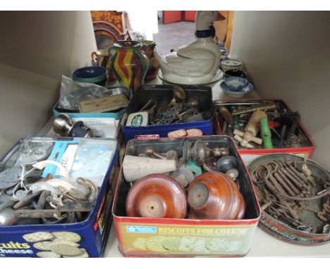 A selection of vintage keys, corkscrews, handles, knobs etc