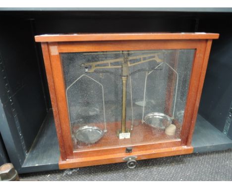 A pair of vintage mahogany laboratory scales 