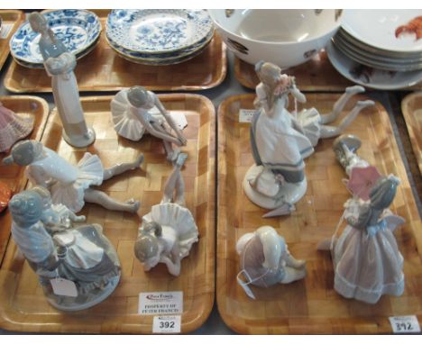 Two trays of Lladro, Nao and other Spanish porcelain figurines to include; ballerinas, Inuit figure groups etc. (2)(B.P. 24% 