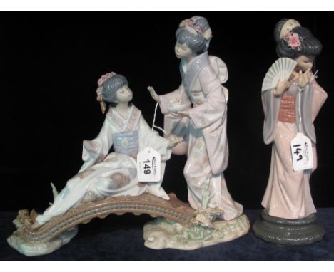 Large Lladro Spanish porcelain oriental figure group on a bridge, together with another oriental Lladro figurine with fan. (B