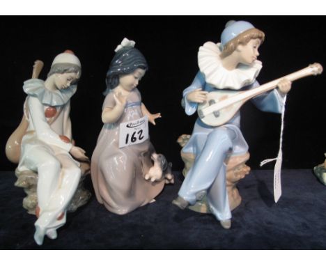 Three Nao Spanish porcelain figurines of a girl with puppy and boy with mandolin etc. (3)(B.P. 24% incl. VAT)