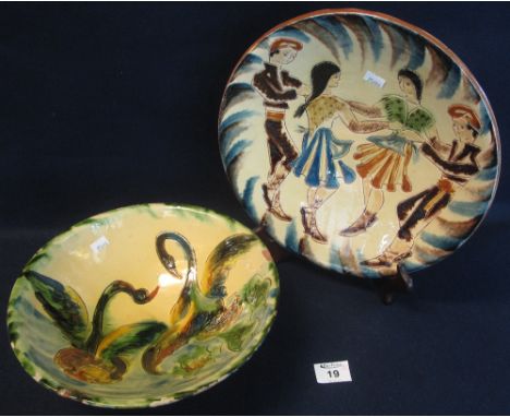 Two similar tin glazed pottery sgraffito decorated items, shallow dish and bowl, the dish decorated with dancing figures (pos