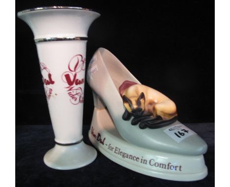 Advertising - ceramic shop display model for Van-Dal shoes in the form of a cat sleeping on a ladies show by Lenham pottery. 