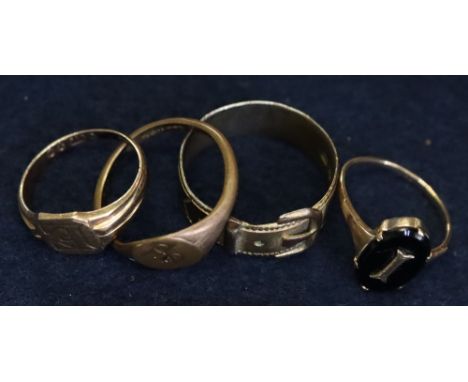 2 9ct gold rings, a brass ring and a silver ring(B.P. 24% incl. VAT) CONDITION REPORT: Both the buckle ring and the monogram 