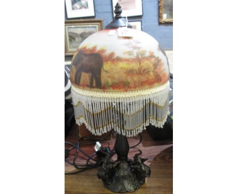 Modern table lamp with glass shade depicting roaming elephants on a bronzed elephant mounted base.(B.P. 24% incl. VAT) 