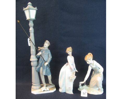 Three Spanish porcelain figures to include; Lladro lamp lighter, another Lladro young girl picking flowers and a Lladro colle