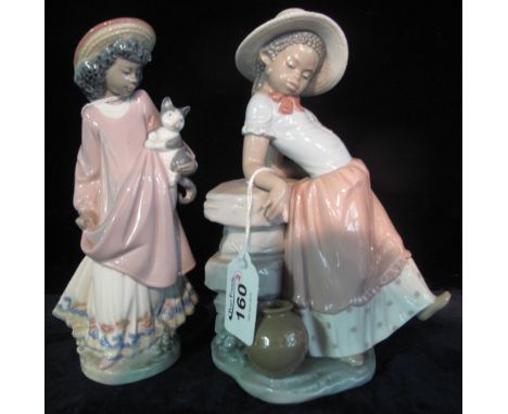 Two Spanish Lladro porcelain figurines marked to the base Daisa 1982 and 1988. (2)(B.P. 24% incl. VAT)