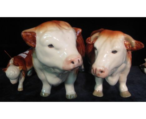 Coopercraft ceramic model study of a bull, together with two other ceramic bulls of varying size. (3)(B.P. 24% incl. VAT) 