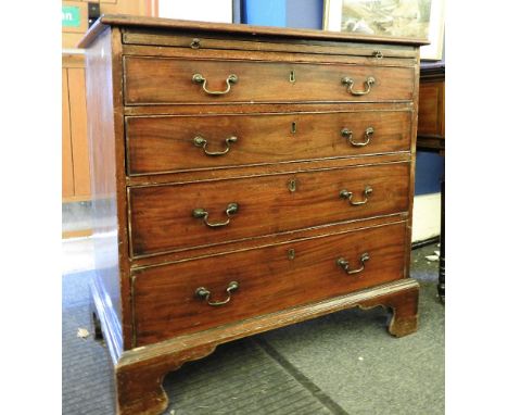 A George III mahogany chest, fitted with a brushing slide over four graduated long drawers and on bracket feet 81 x 47 x 85cm