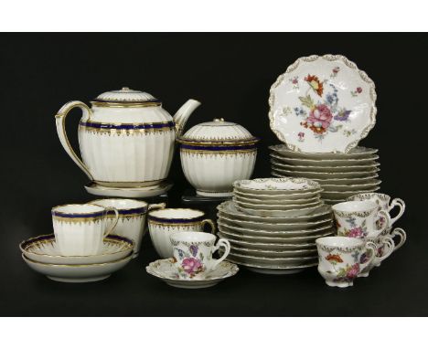A Royal Crown Derby part tea service, the white ground heightened with gilding and royal blue decoration, together with a lar